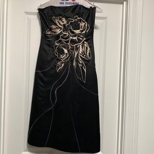 Classic black dress with large embroidered flowers